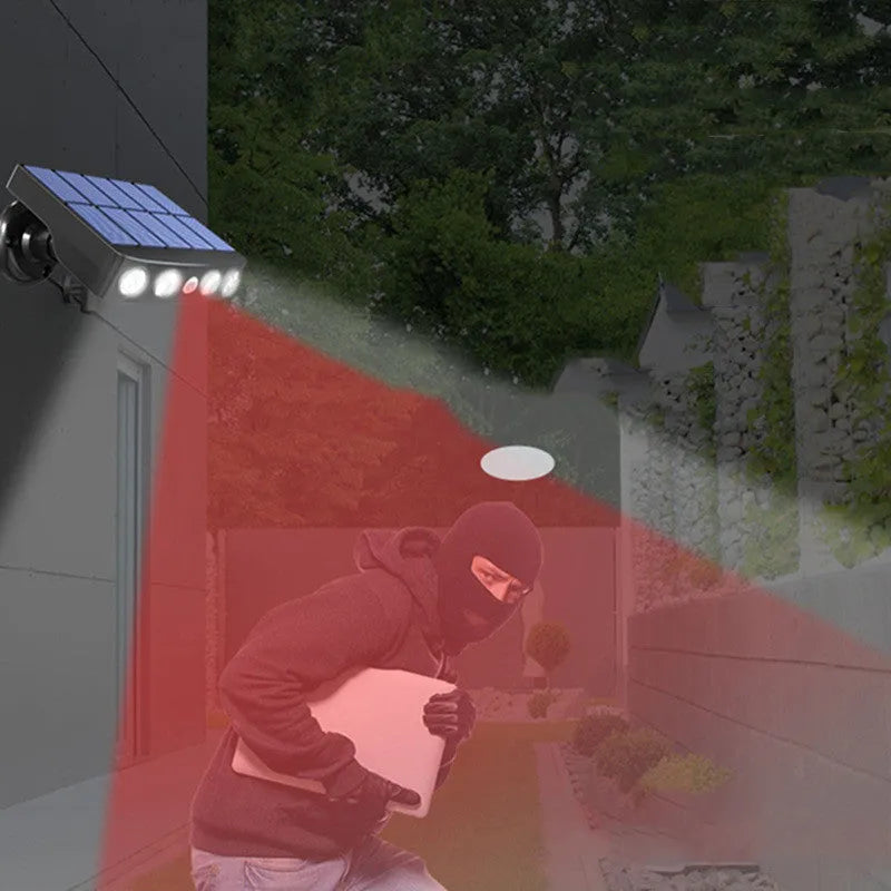 Black and white garden wall lamp with imitation camera and motion sensor for outdoor security lighting
