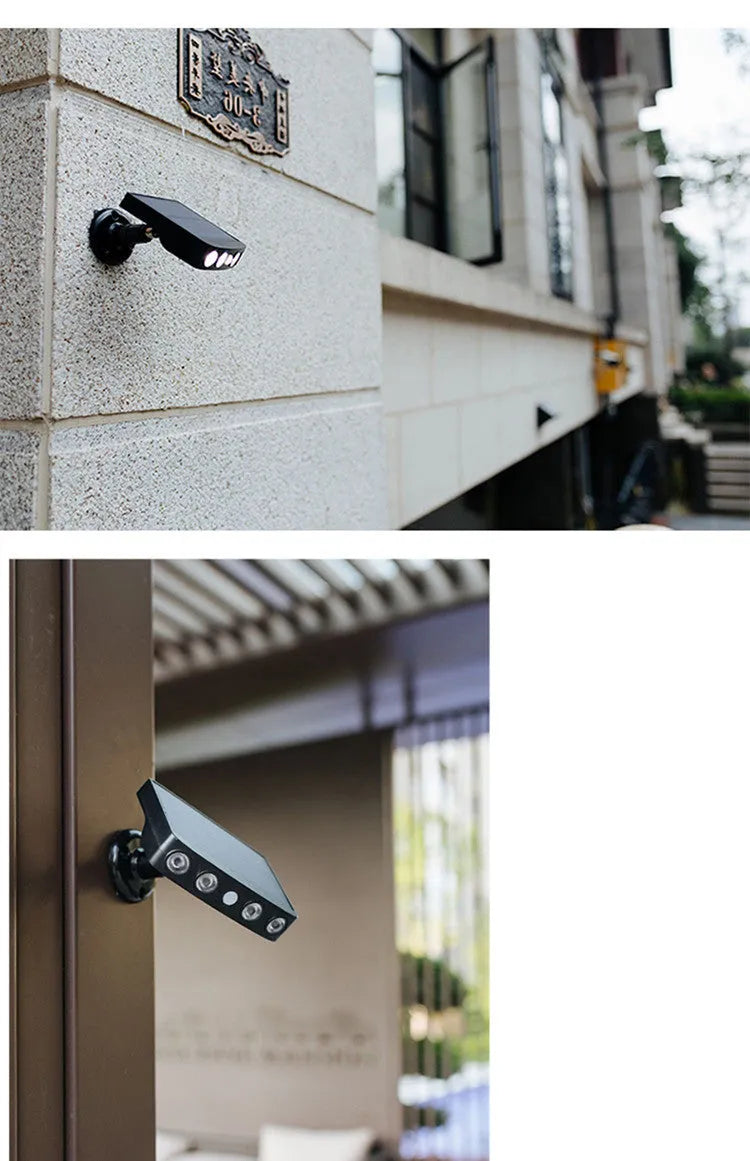 Black and white garden wall lamp with imitation camera and motion sensor for outdoor security lighting