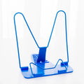 Blue metal and plastic reading frame holding book upright at angle on desk
