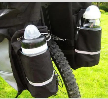 Black mountain bike pannier bag 43L 600D nylon with rain cover and reflective strips attached to bicycle shelf
