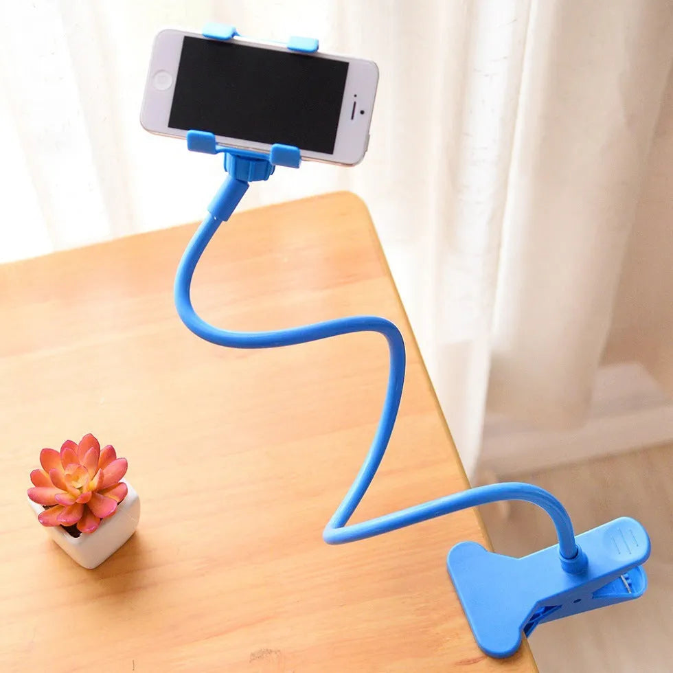 Black flexible long arm phone holder with V-clip extended on a wooden surface
