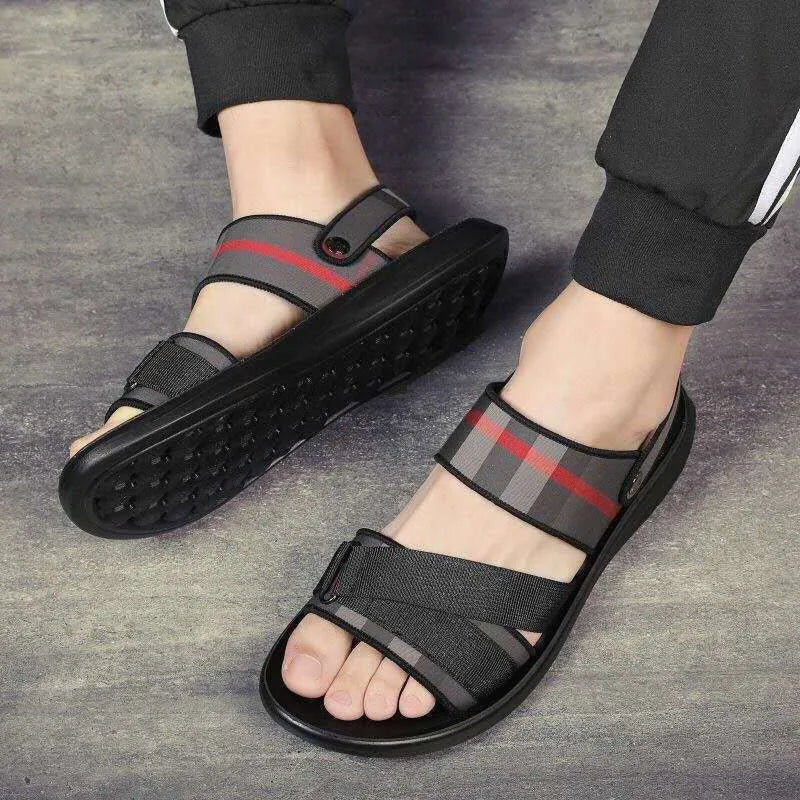Youth leisure sports sandals with blue Lycra upper and textured polyurethane sole.