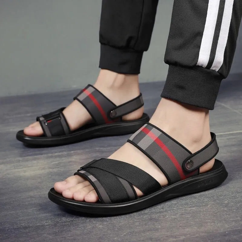 Youth leisure sports sandals with blue Lycra upper and textured polyurethane sole.