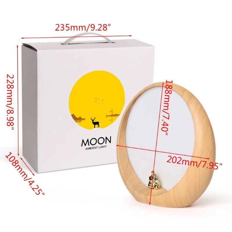 Creative hidden moon light LED table lamp with ABS shade in blue colour on a bedside table