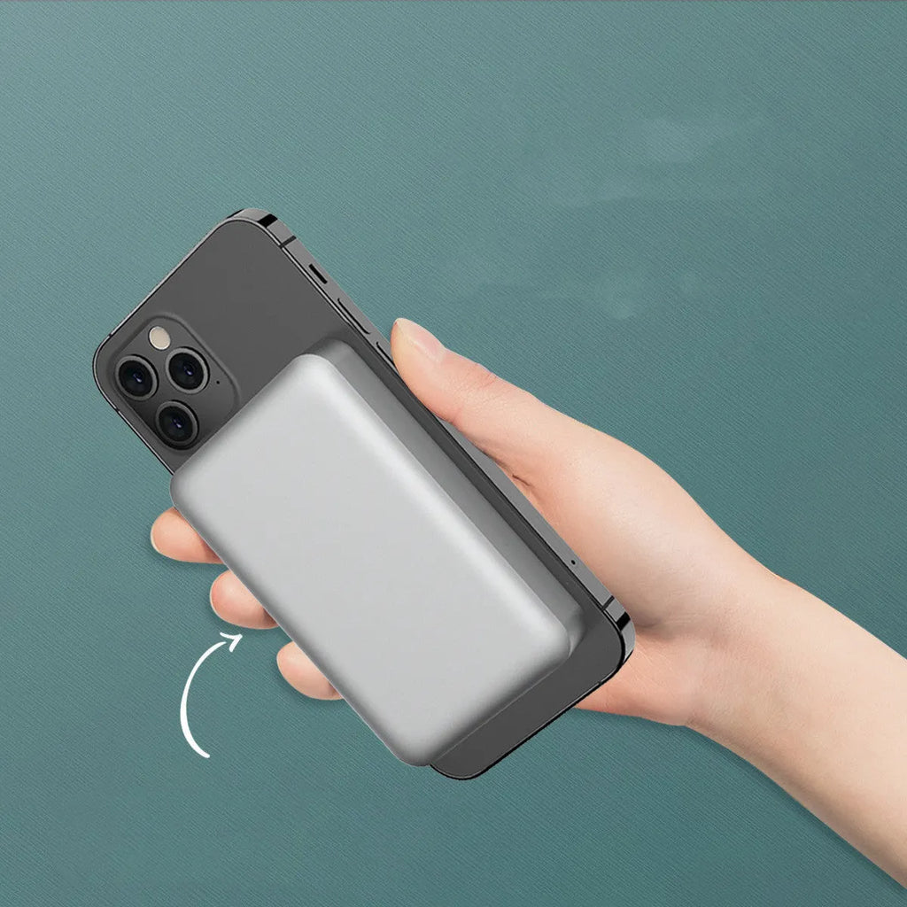 Silver aluminium wireless magnetic charging power bank showing USB-C port and MagSafe ring.