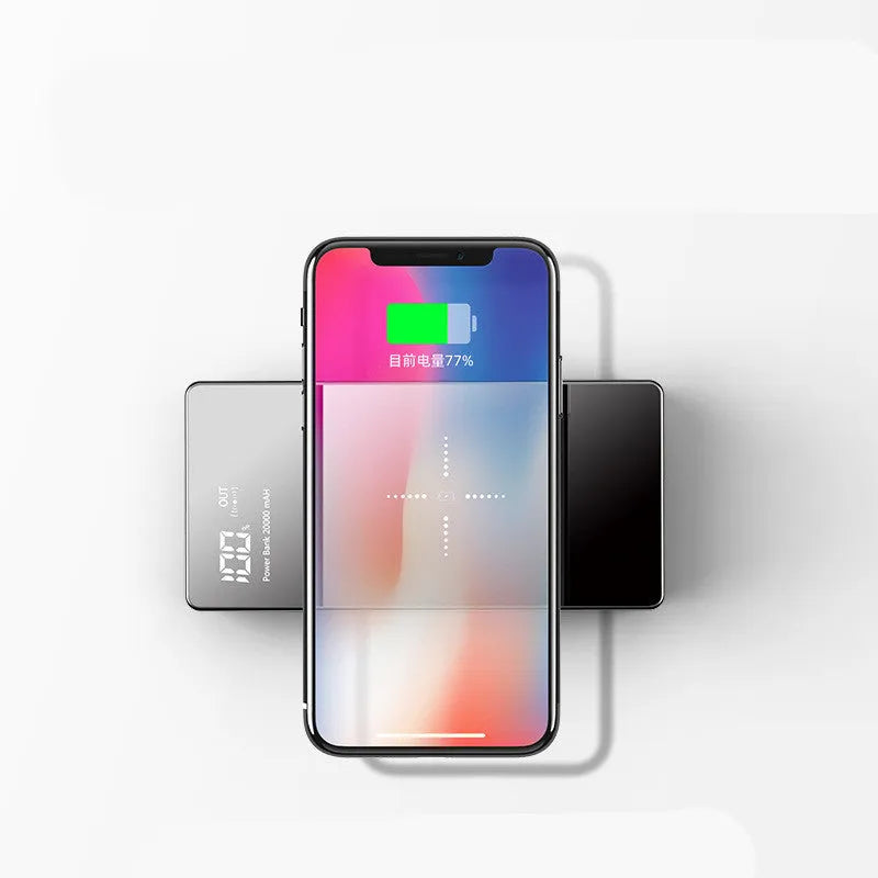 Black wireless charging power bank with digital display showing battery percentage, measuring 73mm x 153mm x 22mm.