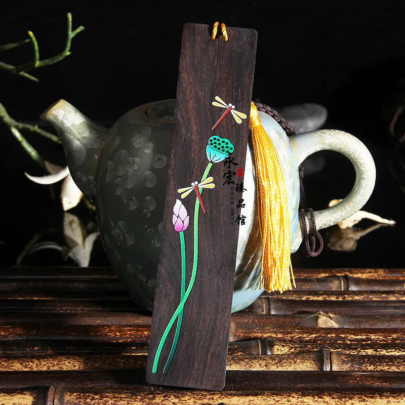 Chinese sandalwood bookmark with painted landscape flower pattern and polished wood finish
