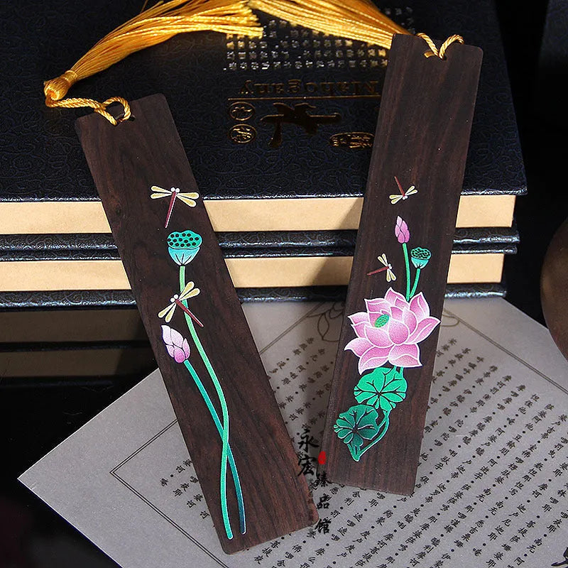 Chinese sandalwood bookmark with painted landscape flower pattern and polished wood finish