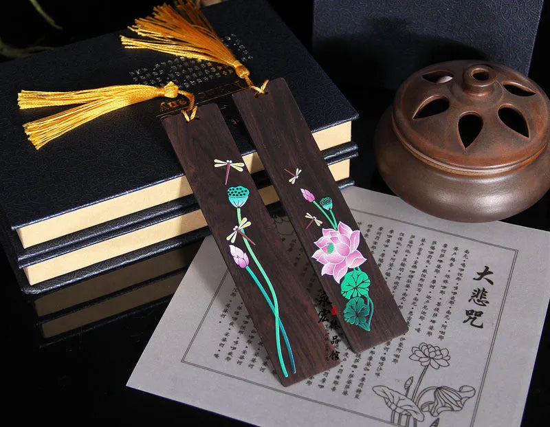 Chinese sandalwood bookmark with painted landscape flower pattern and polished wood finish
