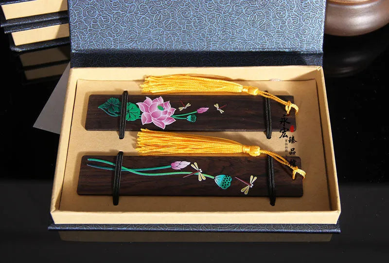 Chinese sandalwood bookmark with painted landscape flower pattern and polished wood finish