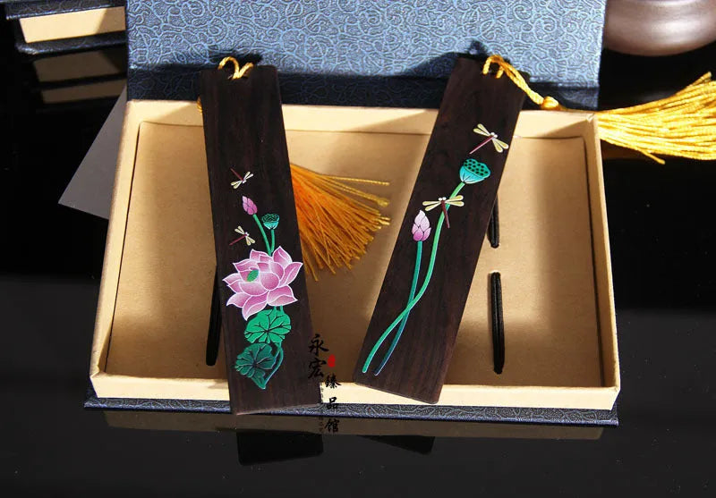 Chinese sandalwood bookmark with painted landscape flower pattern and polished wood finish