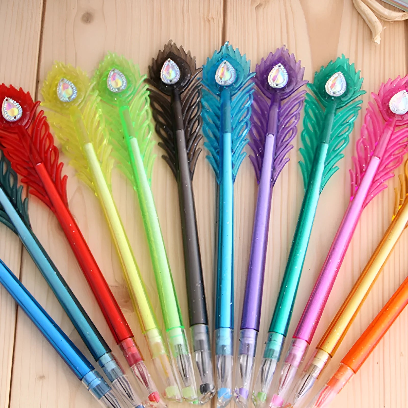 Feather peacock design 12-colour gel pen set with replaceable refills measuring 19cm