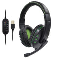 Black AMD-06 wired gaming headset with LED lighting and microphone on a desk