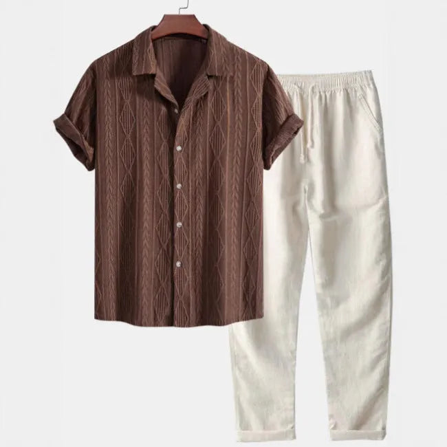 Men's slim fit camouflage print casual suit with short-sleeved shirt and trousers on a hanger