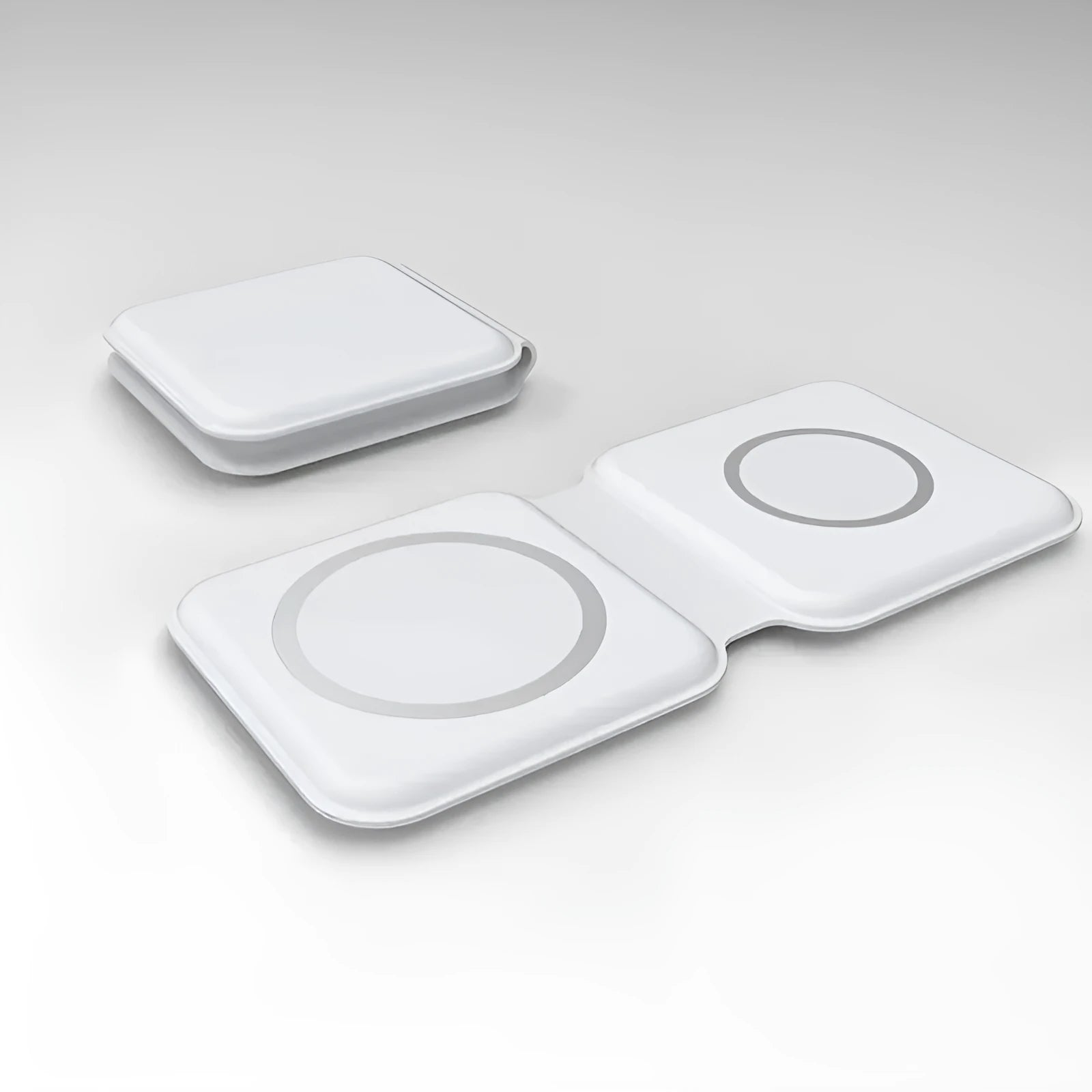 White foldable magnetic wireless charging dock shown open with two phones charging.