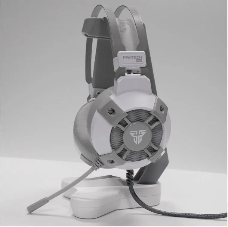 Black FANTECH HG11 USB gaming headset with large ear cups, RGB lighting, and a cable with inline remote control.