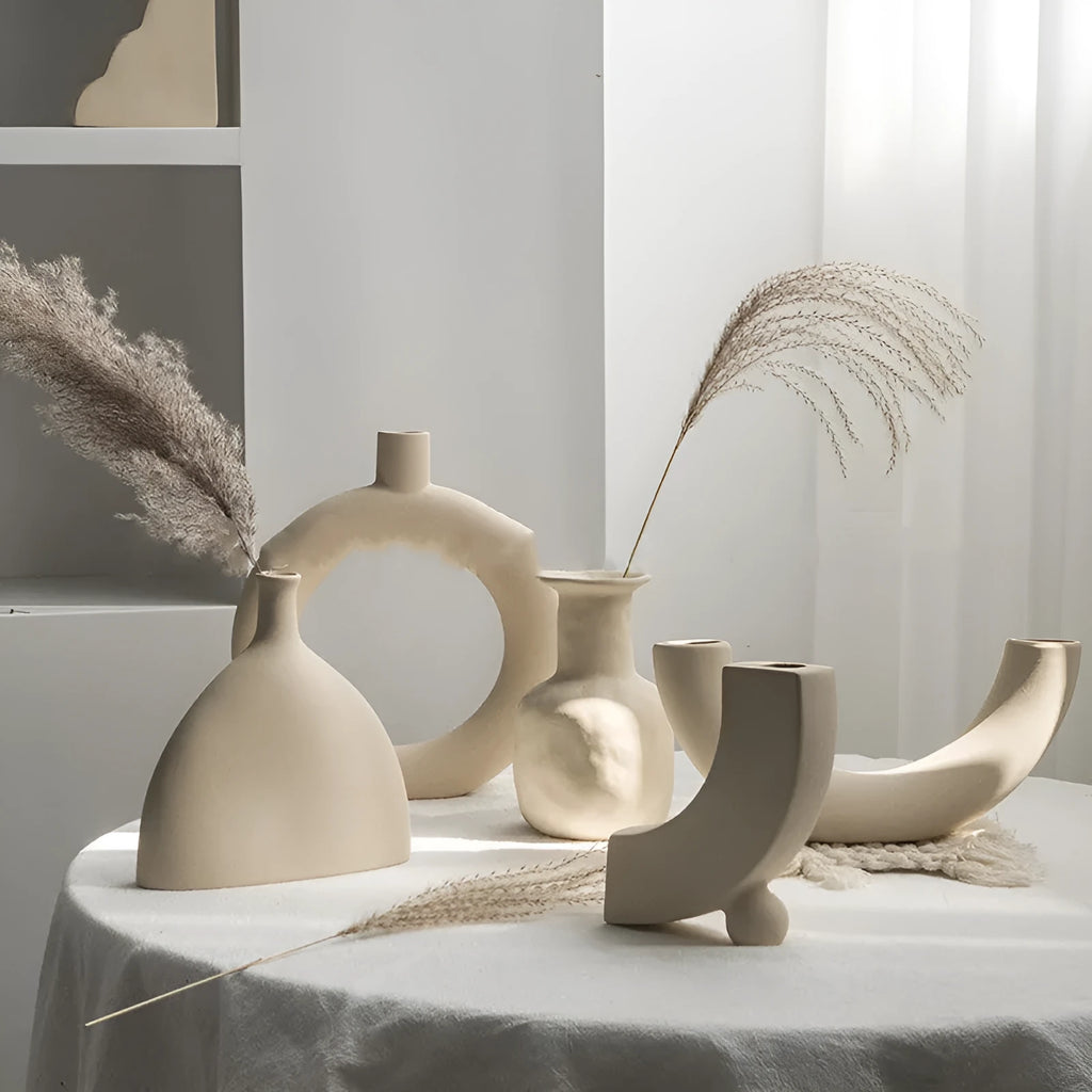 Matte finish unglazed ceramic vase for dry flower arrangements in a Nordic style.