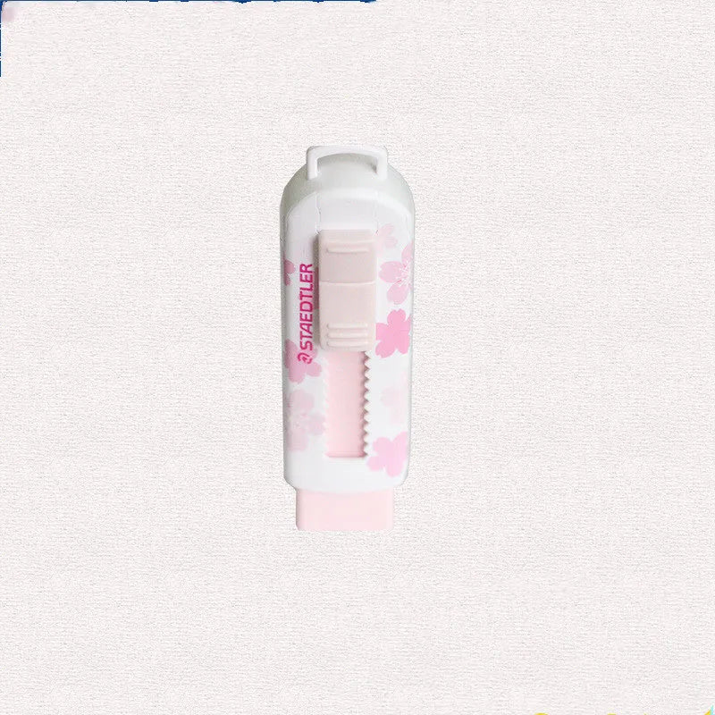 Pink square push-pull student eraser with replaceable core, 86mm long.