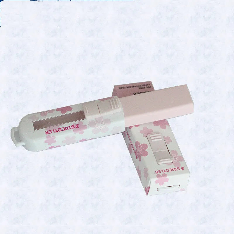 Pink square push-pull student eraser with replaceable core, 86mm long.