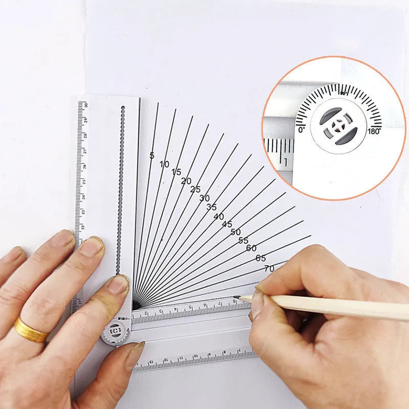 White plastic multi-function ruler measuring 30cm in length.