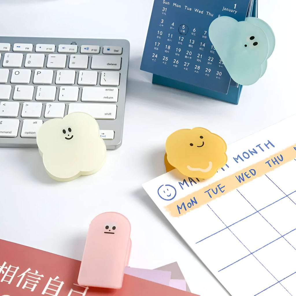 Square translucent acrylic cartoon collage clip in beige, blue, orange, and pink colours on a white background.