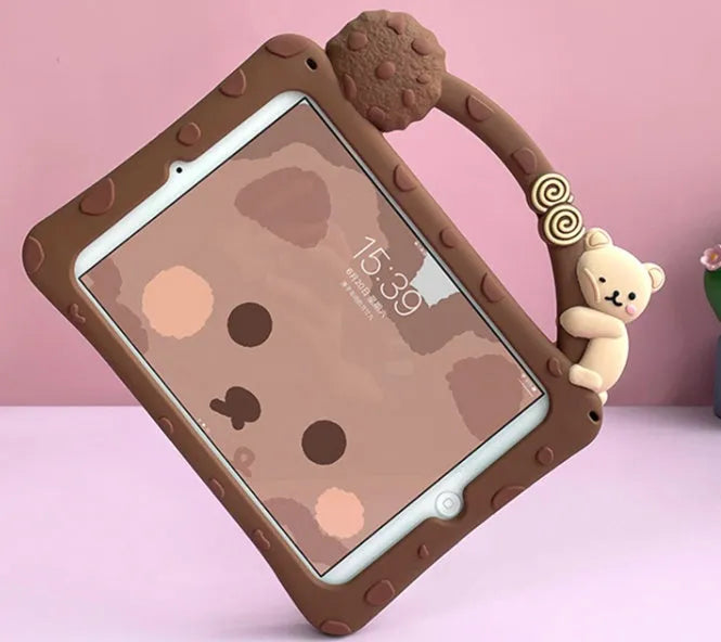 Brown cartoon-style silicone sleeve case for iPad tablets on a flat surface.