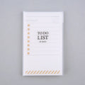 Small yellow frosted PP notebook with tearable pages, shown next to a pen for scale.