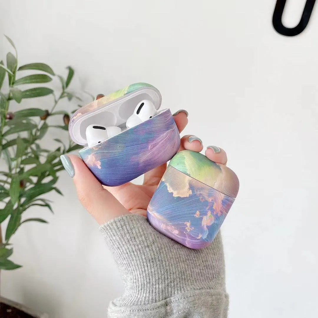 Hard plastic protective sleeve for AirPods Pro case in a blue watercolour design.
