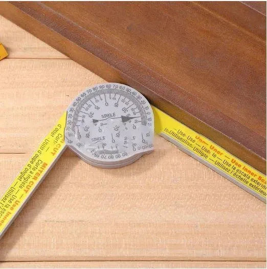 Yellow and white cross-border horizontal angle ruler tool with laser engraved scales on hardened plastic.