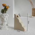 Matte finish unglazed ceramic vase for dry flower arrangements in a Nordic style.