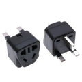 Square white UK to international power adapter with five sockets and a grounded three-pin plug.