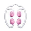 Pink and purple silicone annular leg massage roller for calf and thigh muscle recovery