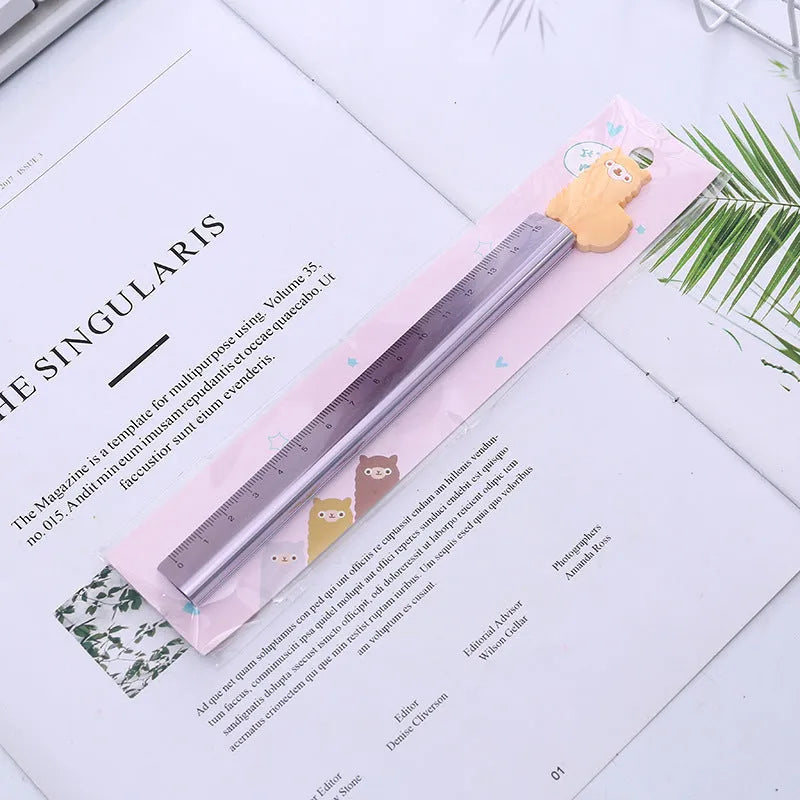 Alpaca pattern printed aluminium ruler with centimetre scale and non-slip rubber strip, 30 cm long.
