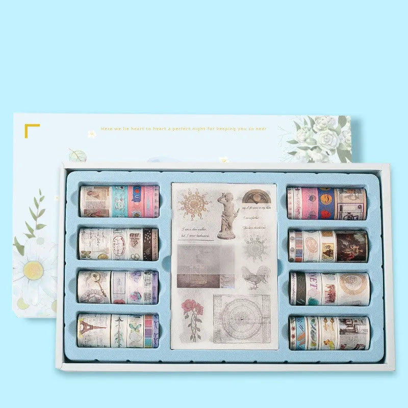 100 rolls of antique character printed hand account tape in a box showing multiple widths and colours