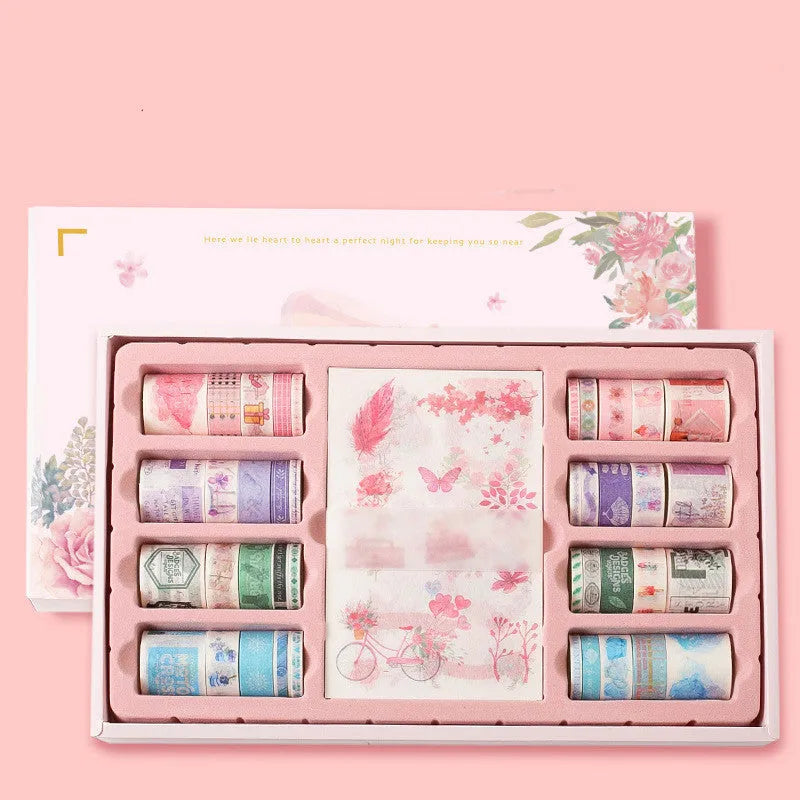100 rolls of antique character printed hand account tape in a box showing multiple widths and colours