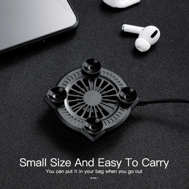 Black USB mobile phone cooling fan with suction cup base attached to smartphone
