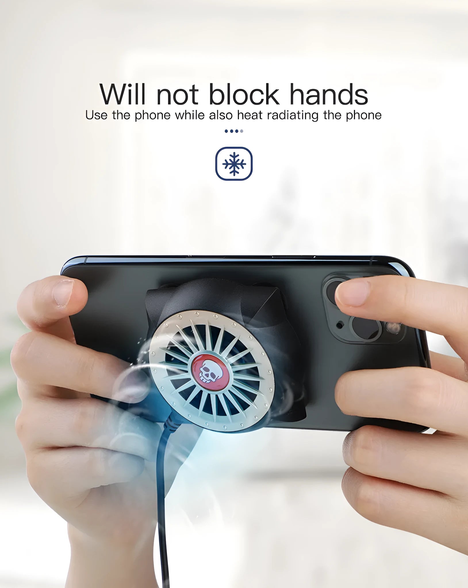 Black USB mobile phone cooling fan with suction cup base attached to smartphone