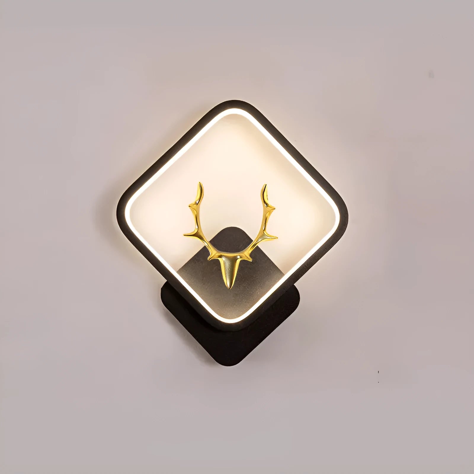 Deer antler shaped wall light with remote control, shown in white and black diamond style options.