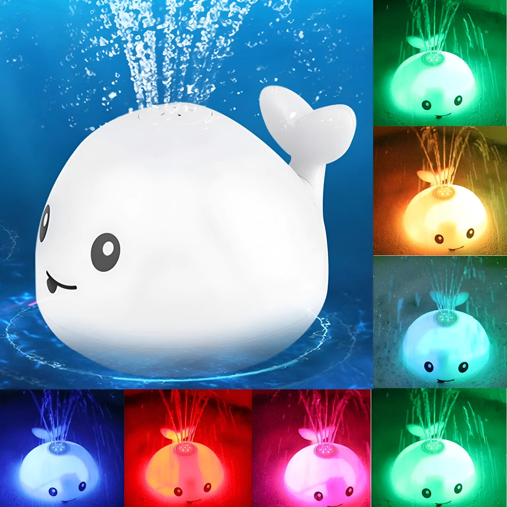 Colourful whale-shaped bath toy spraying water with LED lights illuminated