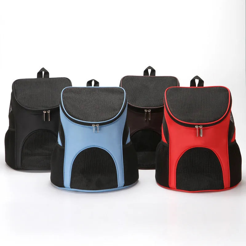 Red portable pet backpack carrier for a small dog, showing shoulder straps and front mesh panel.