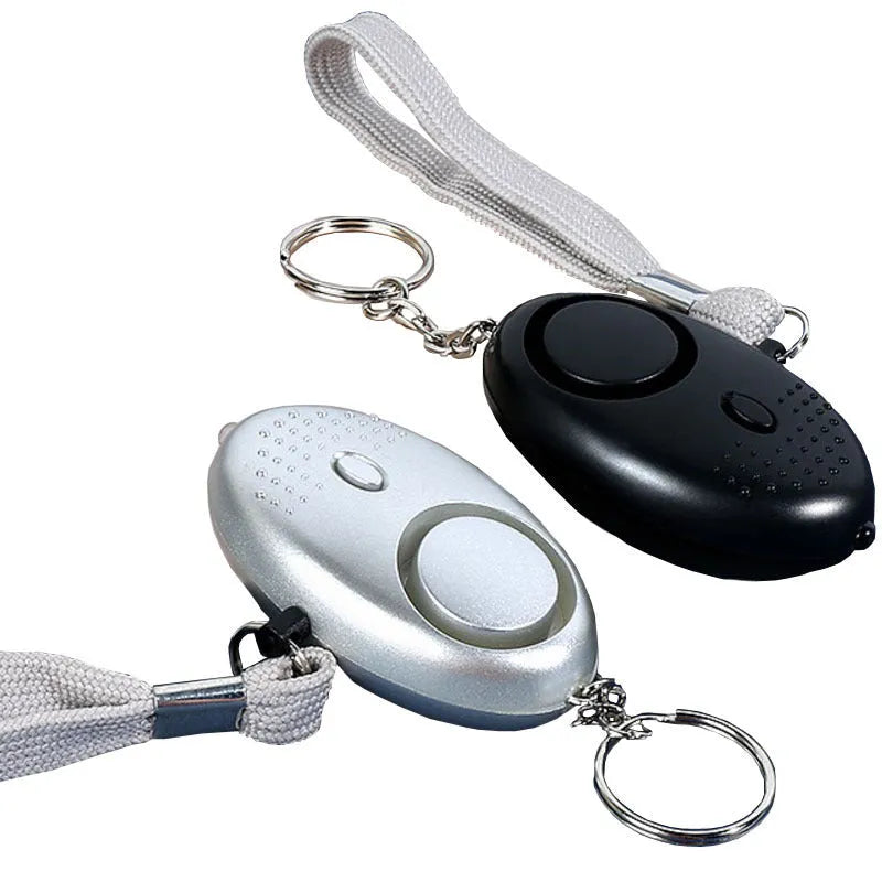130dB personal safety alarm with LED light in multiple colour options including black, white, blue, purple, gold, pink and silver