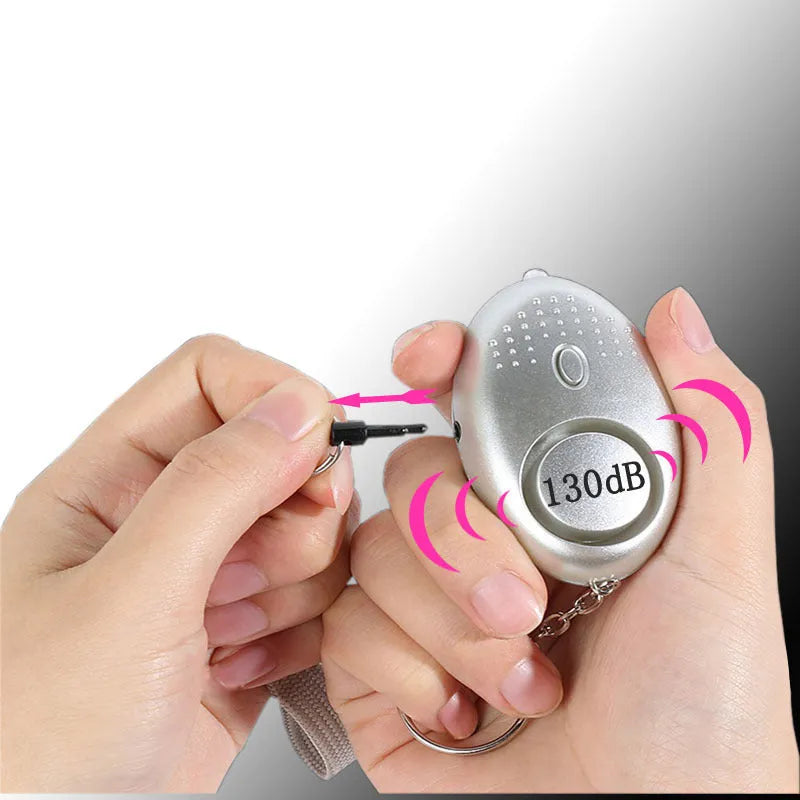 130dB personal safety alarm with LED light in multiple colour options including black, white, blue, purple, gold, pink and silver
