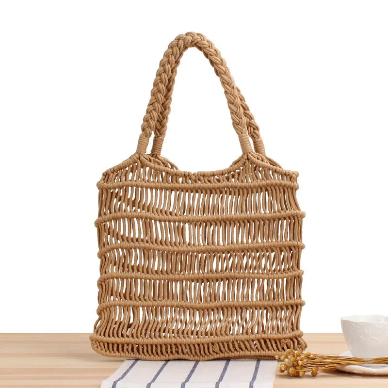 Woven straw medium square beach bag for women with soft double handles in camel colour