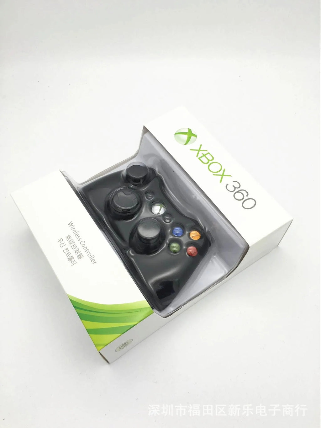 Xbox 360 Wireless Controller in black with thumbsticks, D-pad, and Xbox Guide button