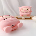 Pink cartoon pig silicone flip case with hook for Apple AirPods 1, 2, and Pro earphones.
