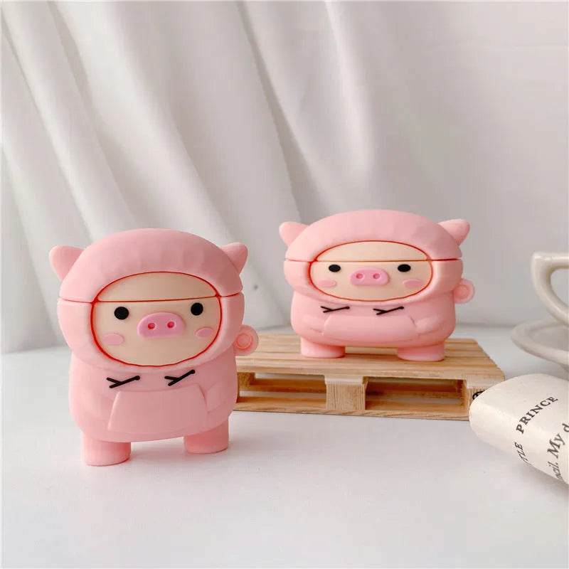 Pink cartoon pig silicone flip case with hook for Apple AirPods 1, 2, and Pro earphones.