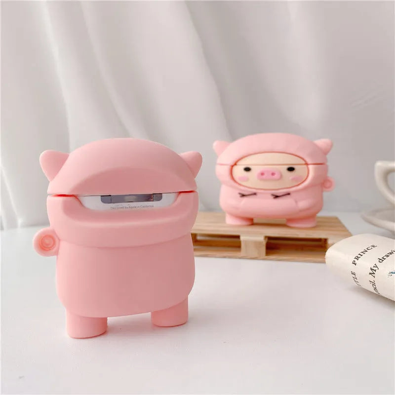 Pink cartoon pig silicone flip case with hook for Apple AirPods 1, 2, and Pro earphones.