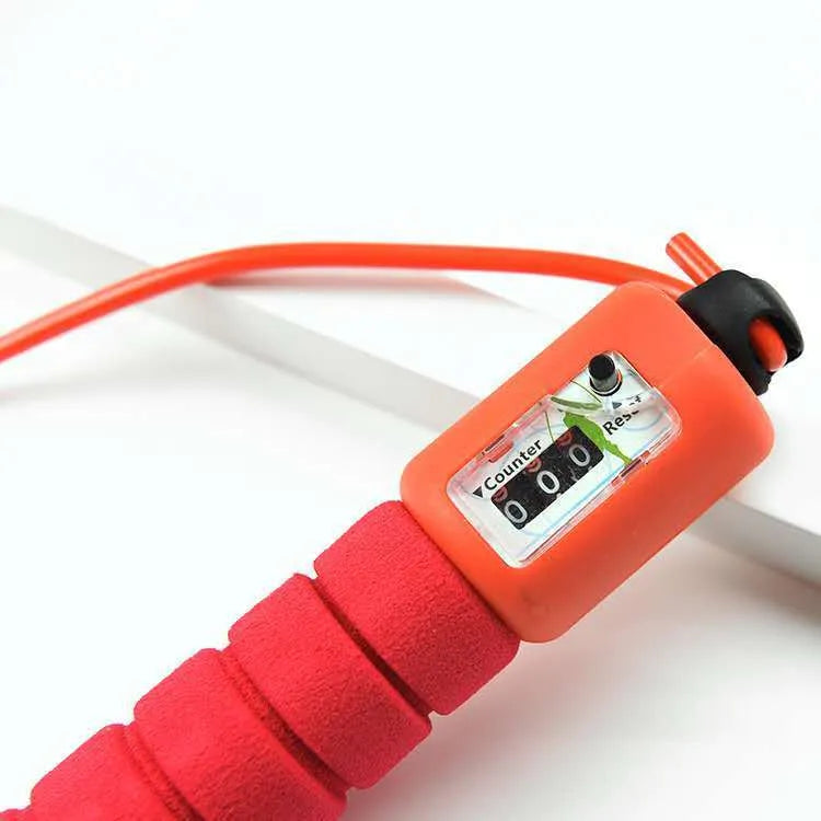 Adult sports skipping rope with digital counter display and sponge-covered handles