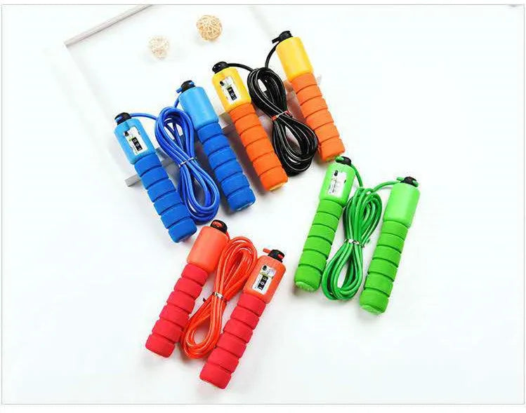 Adult sports skipping rope with digital counter display and sponge-covered handles