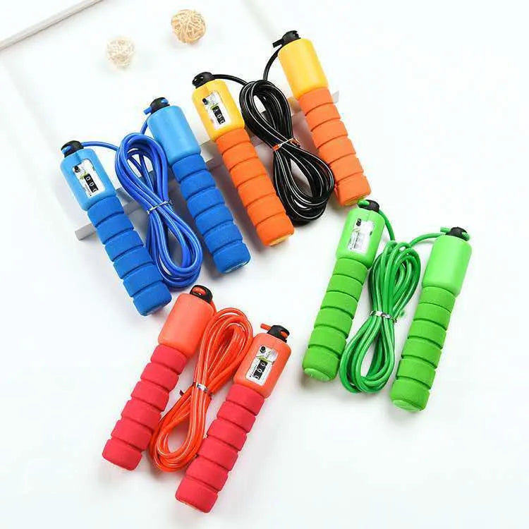 Adult sports skipping rope with digital counter display and sponge-covered handles